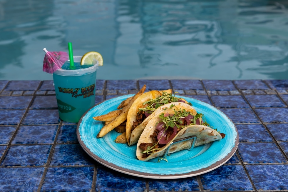 Tacos at Dog Days with a cold drink